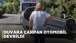CAR HITS WALL AND FLIPS OVER
